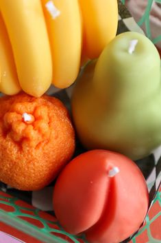 Fruit Candles in Basket - Banana, Peach, Orange, and Pear!-WORM Checkered Paper, Fruit Banana, Fruit Candles, Shaped Candles, Green Basket, Candle Basket, Plastic Basket, Plastic Baskets, Food Candles