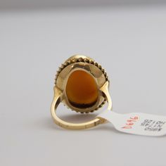 "For sale: (1) d696 Gorgeous 14k Yellow Gold Cameo Ring PLEASE READ ENTIRE DESCRIPTION BEFORE PURCHASING Pre-owned item. Good condition. Please see pictures for details. Sold as is, as seen on pictures. Specifics: 14k Yellow gold Size: 6.75 (U.S.) Width: 23.5 mm Total Weight: 6.7 grams Please be 100% sure of your purchase before buying, as we do not offer refunds. We are more than happy to provide any specific pictures, or answer any questions you have regarding our items. All jewelry is confirm Collectible Yellow Gold Oval Rings, Oval Yellow Gold Rings, Heirloom Yellow Gold Opal Ring Collectible, Hallmarked Opal Ring For Formal Occasions, Hallmarked Opal Ring Fine Jewelry For Formal Occasions, Formal Hallmarked Opal Ring In Fine Jewelry Style, Antique Pear-shaped Gemstone Jewelry, Yellow Gold Oval Cabochon Rings For Formal Occasions, Formal 14k Gold Cabochon Rings