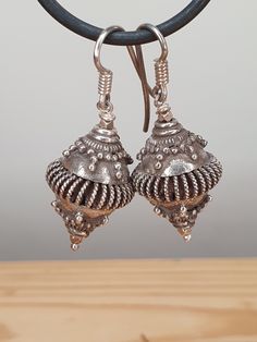 This is a pair of ear-rings bought by myself in Sri Lanka in the 1990's. I bought them to one day to sell; and they have therefore never been worn. The quality of the Sri Lankan silver craftsmanship is in my opinion the very best there is. The quality of the silver is high (I have had it tested in the past and it always came up above 92.5%, above the requirement to be classed as Sterling silver) and the intricate work of the unique Sri Lankan style is a piece of history in itself. Each bead is e Sri Lanka Jewelry, Vintage Sterling Silver Dangle Plug Earrings, Antique Sterling Silver Dangle Earrings, Vintage Sterling Silver Dangle Hoop Earrings, Antique Silver Pierced Drop Earrings, Unique Silver Pendant Earrings, Vintage Silver Pendant Earrings, Antique Silver Dangle Earrings, Antique Silver Drop Earrings