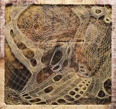 an image of a piece of art that is made out of wire and wood planks