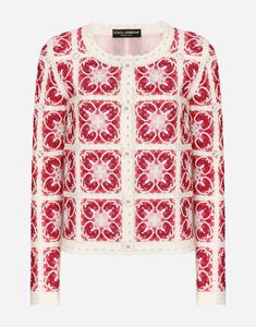 a red and white sweater with an intricate pattern