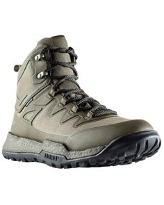 a pair of hiking boots on a white background