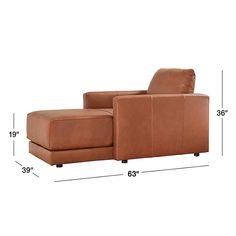 a brown leather chair and ottoman with measurements