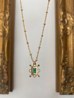 Gold-plated pendant with an emerald green rectangle jewel measuring 2.5 cm long and hung on a gold-plated twisted ball chain measuring 18 inches. Comes in a velvet cushioned box. Matching earrings in a set available here.... https://zarataylor.etsy.com/listing/1521965578 INTERNATIONAL BUYERS please choose the tracking option if you would like your order to be tracked. FREE tracking upgrade with 3 items or more purchased. JEWELLERY CARE please don't wear plated jewellery in the shower, bath or sw Gold Emerald Square Pendant Jewelry, Rectangular Emerald Gold Jewelry, Gold Emerald Square Pendant Necklace, Gold Necklace With Square Emerald Pendant, Gold Emerald Necklace With Square Pendant, Gold Emerald Necklace With Rectangular Pendant As Gift, Gold Emerald Necklace With Square Pendant For Gift, Pieces Of Eight, Art Deco Emerald