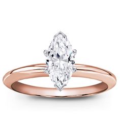 a rose gold engagement ring with an oval cut diamond