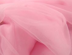 a close up view of a pink fabric