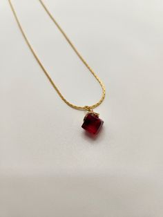 This elegant necklace has a striking color that allows it to be worn in multiple occasions. The necklace is on a 16 inch chain. Red Pendant Chain Jewelry, Red Pendant Necklace With Chain, Red Pendant Chain Necklace With Clavicle Chain, Red Long Necklace With Adjustable Chain, Elegant Red Necklace With Square Pendant, Red Long Necklace Jewelry For Gifts, Elegant Red Necklace With Clavicle Chain, Elegant Red Clavicle Chain Necklace, Elegant Red Square Pendant Necklace