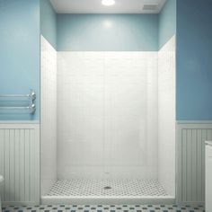 a white toilet sitting next to a shower in a blue and white bathroom with checkered flooring