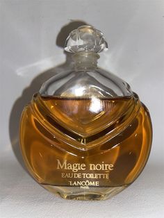 Magie Noire Lancome Perfume Eau de Toilette 1.7 Oz 50 ML Vintage Rare 95% This is a Nearly New Vintage 1.7 Fl Oz (50 ML) Splash bottle of Magie Noire by Lancome. It is a Eau de Toliette. There is approximately 95% product remaining. Please view picture for product details. 100% Authentic. Take Advantage of this Fantastic Deal!!! Items Must Be Paid for Within 3 Days. Will Combine Shipping. Please e-mail with any questions you may have and Thank You for Bidding! All items are available directly on my Perfumewitch.com website. Use Promo code: EbayX to get 10% off and free shipping on orders of $25 or more. Powered by SixBit's eCommerce Solution 90s Perfume, Lancome Perfume, Ecommerce Solutions, Vintage Perfume, Womens Fragrances, Women Fragrance, New Vintage, Health And Beauty, 50 %