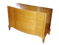 a wooden dresser with three drawers on one side