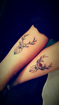 two people with matching tattoos on their legs