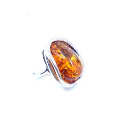 So shiny and sparkling! Silver layered setting for an extra touch! Stones: Cognac Baltic Amber SKU: AMRG020624-05 Dimensions: 1" long x 3/4 "wide x 1/2" depth Sizes adjustable 7.5 to 9 Material: .925 Sterling Silver Made In: Poland Adjustable Amber Open Ring Jewelry, Adjustable Cabochon Ring For Formal Occasions, Adjustable Cabochon Rings For Formal Occasions, Adjustable Amber Open Ring, Adjustable Sterling Silver Ring With Amber Color, Adjustable Sterling Silver Amber Ring, Adjustable Amber Cabochon Rings, Adjustable Sterling Silver Rings In Amber, Adjustable Oval Amber Ring