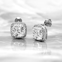 Cushion Halo Stud Earrings, Cushion Simulated Diamonds Stud, Wedding Studs, Bridesmaid Studs, 13 MM Cushion Cut Stud Earrings Description:: Metal: 925 Sterling Silver Stone: Simulated Diamonds Stone Shape: Cushion Total Carat Wt.: 10.50 CT. Center Stone Wt.: 5.00 CT. x 2 Length: 13 MM Width: 13 MM Simulated Diamonds: D Color | VVS1 Clarity Closure: Push Back * Contact Us for Custom Orders. * Customization also available. * All Ring Sizes available please choose from drop down. * If you have any Cubic Zirconia Round Cut Cluster Earrings For Wedding, Wedding Cluster Earrings With Diamond Accents, Wedding Cluster Drop Earrings With Diamond Accents, Formal Diamond White Crystal Earrings With Halo Design, Bridal Halo Earrings Made Of Cubic Zirconia, Halo Cubic Zirconia Bridal Earrings As Gift, Sterling Silver Cushion Cut Wedding Rings, Cubic Zirconia Bridal Earrings With Halo, Bridal Halo Earrings With Cubic Zirconia