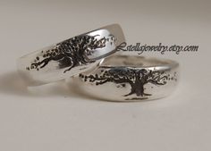 "Band - Tree of Life design in a slightly Tapered light weight Band. I carve the tree design in wax and then cast it in sterling. A great ring for the \"green\" person in your life. Offered here in a set of two. For the lover of trees and interconnection of life on our planet. I usually can get these out in a couple of day to a week. Please feel free to contact me for rush orders. About 6mm or almost 1/4\" at the widest point and tapers to 3.5mm,(approx.) at the narrowest point. Edges are rounde Wedding Rings Stackable, Tree Themed Wedding, Green Person, Unique Wedding Band Sets, Flower Ear Cuffs, Nature Wedding Ring, Twig Wedding Band, Tree Of Life Design, Silver Bands