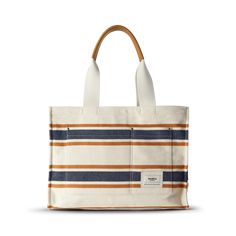 Meet the Runabout Open Tote—our unisex, everyday travel companion that’s just as functional as it is good-looking. | Shinola Runabout Open Tote Bag | Canvas White Everyday Laptop Tote Bag, White Large Capacity Laptop Bag For Everyday, White Everyday Shoulder Laptop Bag, Casual Bags With Pockets In Coated Canvas, White Tote Laptop Bag For Everyday Use, Casual Coated Canvas Bags With Pockets, Everyday White Shoulder Laptop Bag, Casual Laptop Bag With Leather Handles For On-the-go, Everyday White Travel Bag With Leather Handles