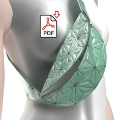 a woman wearing a green fanny bag on her chest with the word pdf printed on it