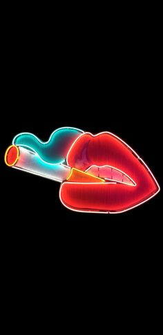 an image of a woman's lips with neon lights in the shape of her mouth