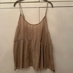 O’neill Adjustable Spaghetti Strap Top. Brown, Tan, White, And Blue Colored In Stripe Pattern. Pull-On. Ruffle Bottom. Tie On Back. O’neill Emblem To Bottom Of Front Of Left Top. 100% Cotton. Size Xl. Never Worn. New With Tags. Summer Beach Camisole With Adjustable Straps, Casual Cami Tank Top For Beach Season, Summer Beach Tops With Adjustable Straps, Casual Vacation Camisole With Adjustable Straps, Beige Spaghetti Strap Tank Top For Beach, Beige Camisole For Beach, Beach Cotton Tank Top With Adjustable Straps, Striped Summer Tank Top For Vacation, Casual Spaghetti Strap Tank Top For Beach Season