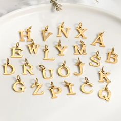 ✨ Add a personal touch to your jewelry collection with these stunning 14k gold-plated alphabet charms! Available in letters A-Z, each charm is beautifully crafted to elevate your necklaces, bracelets, or anklets. Whether you're spelling out a name, celebrating a special occasion, or gifting a loved one, these letter charms make the perfect addition to any look. Key Features: Material: 14k gold plated for a luxurious and lasting shine. Letters: Full selection from A to Z. Versatile: Easily attach Charms For Jewelry Making, Necklace Accessories, Chain Anklet, Letter Charms, Initial Charm, Diy Earrings, Accessories Necklace, Jewelry Making Supplies, Earring Necklace