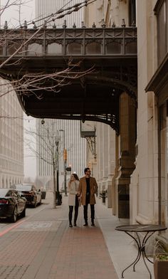 Downtown Tulsa Photoshoot, Chicago Christmas Photoshoot, Downtown Christmas Photo Shoot, Engagement Photos Industrial, Downtown Photoshoot Couple, Downtown Couple Photoshoot, Urban Couple Photoshoot, New York Winter Outfits, Couples Outfits Matching