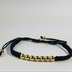 Brand New Adjustable Black Friendship Bracelets For Party, Adjustable Casual Friendship Bracelets For Parties, Black Beaded Bracelets With Adjustable Length, Casual Gold Beaded Bracelets For Party, Black Adjustable Bracelet For Everyday Wear, Casual Gold Friendship Bracelets, Black Casual Bracelets With Adjustable Length, Casual Black Jewelry With Adjustable Length, Black And Gold Bracelet