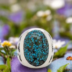 Embrace the artistry of the Southwest with this captivating Handmade Kingman Turquoise Ring (Size 9). Crafted by a skilled Arizona artisan, this unique piece features a genuine Kingman turquoise gemstone, renowned for its captivating blue hues and intricate matrix patterns.Genuine Kingman Turquoise: The centerpiece of this ring is a stunning Kingman turquoise stone, boasting the captivating beauty of the American Southwest.A Touch of Luxury: This handcrafted ring adds a touch of sophistication a Artisan Turquoise Cabochon Ring, Artisan Turquoise Gemstone Ring, Artisan Turquoise Ring With Chrysocolla, Unique Turquoise Ring With Cabochon, Handmade Turquoise Spiritual Ring, Handmade Spiritual Turquoise Ring, Artisan Style Turquoise Ring As A Gift, Artisan Turquoise Ring With Natural Stones, Artisan Turquoise Ring As A Gift