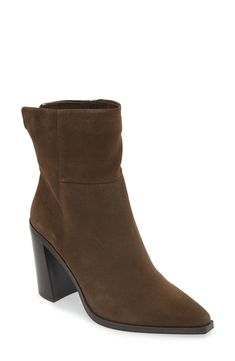 Elevate your cool-season looks with this sleek side-zip bootie framed with a snipped pointy toe and angular stacked heel. 3 1/2" heel 7 1/2" shaft; 12" calf circumference Leather upper/textile and synthetic lining/synthetic sole Imported Chic Boots With Side Zipper For Fall, Fall Boots With Zipper Closure And Pointed Toe, Trendy Fall Heeled Boots With Side Zipper, Trendy Heeled Boots With Side Zipper For Fall, Brown Pointed Toe Heeled Boots With Zipper, Brown Pointed Toe Heeled Boots With Zipper Closure, Fall Ankle Booties With Sculpted Heel, Chic High Heel Boots With Side Zipper, Trendy Fall Boots With Side Zipper