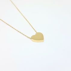 -The heart necklace for women is made with high quality 14K real solid gold. - This cute, charm, dainty, delicate and trendy women jewelry pendant necklace has been artfully designed for timeless yet modern millennial fashion and you can order in three different colors, yellow, white and rose gold. -We have listed the same heart model as a bracelet . - This 14K real solid gold pendant comes with a beautiful matching 14K real gold chain. - You receive the pendant in a beautiful and free gift box Minimalist Hypoallergenic Heart Necklace For Valentine's Day, Minimalist Hypoallergenic Heart Necklace, Simple Gold Charm Necklace For Valentine's Day, Simple Gold Heart Necklace For Valentine's Day, Minimalist 14k Gold Heart Necklace For Anniversary, Minimalist Heart Cut Necklace For Anniversary, Minimalist Hypoallergenic Heart Charm Necklace, Dainty Heart Charm Necklace For Birthday Gift, Dainty Charm Necklaces For Anniversary Gift