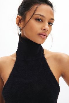 Modern Silence + Noise sweater tank in a fuzzy, eyelash knit. Designed in a slim & cropped fit featuring a high halter neckline, scoop shoulders and an open back. Exclusively at Urban Outfitters. Features Silence + Noise Selena eyelash knit mockneck halter sweater High neck sweater tank Fuzzy eyelash knit High halter neckline with scooped shoulders Open back Slim fit Cropped length Easy pull-over style UO exclusive Content + Care 100% Polyamide Machine wash Imported Size + Fit Model in Black is High Neck Crop Top For Night Out, Turtleneck Crop Top For Fall Night Out, Fall Turtleneck Crop Top For Night Out, Chic High Neck Winter Crop Top, Halter Sweater, High Neck Sweater, Sweater Tank, Beauty Wellness, Halter Neckline