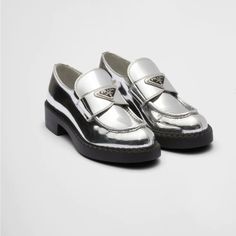 Metallic Leather Loafers Modern Flat Platform Loafers For Formal Occasions, Modern Patent Leather Pointed Toe Loafers, Modern Almond Toe Loafers For Galas, Luxury Brogue Detailing Closed Toe Loafers, Silver Leather Loafers For Work, Luxury Slip-on Tassel Loafers With Round Toe, Pointed Toe Loafers With Brogue Detailing For Galas, Silver Flat Loafers For Work, Luxury Tassel Loafers With Flat Heel For Formal Occasions