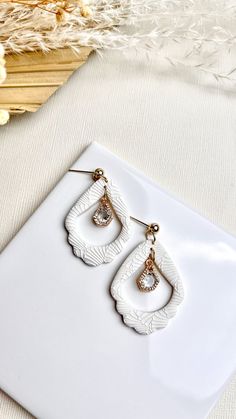 ZARA – Rayza's Art Studio Elegant Teardrop Polymer Clay Earrings, Elegant Hypoallergenic Polymer Clay Jewelry, Elegant Teardrop Polymer Clay Jewelry, White Dangle Earrings In Polymer Clay, White Polymer Clay Dangle Earrings, White Polymer Clay Earrings With Ear Wire, White Pierced Teardrop Earrings As Gift, White Teardrop Pierced Earrings As Gift, White Teardrop Plug Earrings As Gift