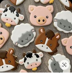 many decorated cookies with farm animals on them