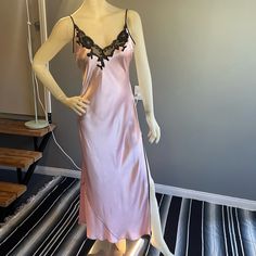 Beautiful Vintage Victoria’s Secret Pink & Black Slip Dress. Adjustable Straps. 100% Silk With Black Lace Trim. Side Slit With Lace Detail. Scalloped Edges. Maxi Length. Size Medium Black Lace Trim, Black Slip Dress, Silk Slip Dress, Silk Slip, Scalloped Edges, Pink Silk, Victoria's Secret Pink, Lace Detail, Pink Black