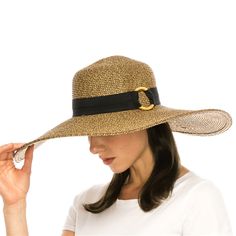 A fabulous straw beach hat. Grosgrain band with large bamboo ring detail. Slightly floppy brim, 6" wide. Ribbon inner band with drawstring to reduce size. UPF 50+ rated sun protection hat. The extra wide brim provides excellent sun coverage. One size, 57 cm. 100% paper braid. Bamboo Ring, Straw Beach Hat, Lifeguard Hat, Style Bucket Hat, Outback Hat, Mens Hats Fashion, Straw Hat Beach, Sun Visor Hat, Wide Brim Fedora