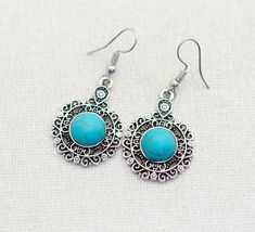 Vintage Round Native American Turquoise Dangle Earrings This beautiful circular pair of teal and silver tone dangle earrings is perfect for special occasions! GENERAL DESCRIPTION Color: Teal, Silver Tone Material: Stone, Metal Length: NA Brand: NA Last photo includes measurement photo Please reach out if you need anything! Teal And Silver, Turquoise Dangle Earrings, Silver Turquoise Jewelry, Turquoise Earrings Dangle, Native American Turquoise, American Turquoise, Christmas 2024, Silver Turquoise, Turquoise Jewelry