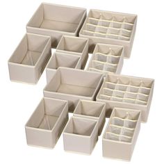 six white storage bins with dividers on each side and four separate compartments in the middle