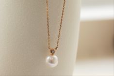 A combination of two birthstones for April (diamond) and June (pearl), the Saltwater Pearl & Diamond Necklace is a finishing piece for any classy occasion. Pairing suggestion:Saltwater Pearl & Diamond EarringsDimensions:Chain length: 40 cm, adjustable up to 42 cm (approx. 15.7 to 16.5 in) Materials used (pictured):14K solid rose gold, 1.44 g1 x saltwater pearl, 7 mm1 x champagne diamond, 0.1 ct Diamond Jewelry With Pearl Drop For Gift, Elegant Pearl Necklace With Gemstone For Gift, Elegant Pearl Charm Jewelry For Anniversary, Elegant Pearl Birthstone Necklace, Timeless Wedding Necklace With Birthstone, Elegant Akoya Pearl Jewelry With Briolette Cut, Elegant Akoya Pearl Jewelry In Briolette Shape, Pearl Briolette Jewelry For Anniversary, Elegant Akoya Pearl Briolette Jewelry