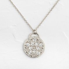 This solid 14k gold pendant is 19.5mm in diameter and 2mm thick. Also available in platinum.It features ten pear cut diamonds (3x4-3x5mm) and ten round white diamonds (1-1.5mm). All accent diamonds are SI clarity and G+ color.The pendant is available on its own or with a 20" cable chain that matches your choice of metal: solid 14k gold or platinum.We handcraft each piece with responsibly sourced metals and ethically sourced stones. Diamond White Platinum Necklace With Rose Cut Diamonds, Platinum Diamond Necklace With Rose Cut Diamonds, Oval Diamond Pendant Necklace With Rose Cut, Diamond White Flower Pendant Necklace With Single Cut Diamonds, Timeless Silver Diamond Pendant Necklace, Silver Teardrop Pendant Necklace With Single Cut Diamonds, Timeless Sterling Silver Pendant Diamond Necklace, Timeless Silver Diamond Necklace With Teardrop Pendant, Timeless Rose Cut Diamond Pendant Necklace