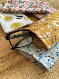 "This eyeglasses case is handmade by me, lined with a coordinating fabric and fusible fleece for structure. Measurement approximately: 7\"X3.5\" Note that this listing is for ONE eyeglasses case.  **Check my other listing below for more cute floral fabric eyeglass cases** https://www.etsy.com/listing/1443889633/eyeglasses-casesunglasses-casefloral?click_key=6d6c92d4772dffd7ce9e0b9bcd79a4d70d0cba8c%3A1443889633&click_sum=6b427bf7&ref=shop_home_active_2&sts=1 There may be slight variations to pattern placement on fabric. Fabric color may vary between computer monitor or phone/tablet screens. Thank you!" Fabric Phone Case, Glasses Cases To Sew, Sew Eyeglass Cases, Eyeglass Cases Pattern, Fabric Eyeglass Cases, Eye Glasses Case, Fusible Fleece, Handmade Sunglasses, Glasses Cases