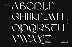 the upper and lower case of an english alphabet, in white ink on a black background