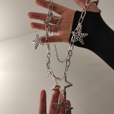 features: Stars and Starfish designed  style: Boho-hippie lenth of stars:   large - 5 cm /  small- 4 cm / starfish- 3.5 cm *Click the link to reach more fantrastic varieties of rings, earrings, necklaces, braceletc, anklets etc. https://www.etsy.com/uk/shop/SalihaDesigns?ref=shop_sugg *40% OFF on 3+ items. Use coupon CODE003 at the checkout. https://www.etsy.com/uk/shop/SalihaDesigns?coupon=CODE003 All photos on my page are original, not edited. *A great gift for lover of long necklace . *Two di Star-shaped Metal Clavicle Necklace, Star-shaped Metal Clavicle Chain Necklace, Metal Star-shaped Clavicle Chain Necklace, Metal Star-shaped Clavicle Necklace, Trendy Silver Star Necklace, Silver Star Necklace With Chain, Star-shaped Metal Chain Jewelry, Trendy Star-shaped Chain Jewelry, Party Necklaces With Star Charm