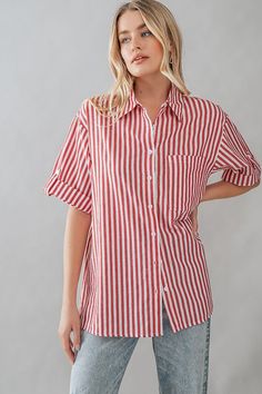 Introducing the Rolled Cuffs Short Sleeves Collared Button Down High-Low Stripe Shirt - a perfect blend of casual comfort and chic style. The rolled cuffs add a laid-back vibe, creating a relaxed yet polished look. Round Top Collection, Patriotic Dresses, Athleisure Leggings, Patriotic Fashion, Handbag Charms, Stripe Shirt, Cuffed Shorts, Flat Sneakers, Jean Leggings