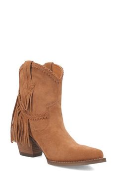 Fringe trim adds a boho-chic spin to an abbreviated Western boot grounded by comfort-focused cushioning that makes the style an around-town favorite. 3" heel 7" shaft Pull-on style Cushioned footbed Leather upper/textile lining/synthetic sole Imported Bohemian Suede Boots With Fringe, Bohemian Suede Winter Boots, Bohemian Suede Fringe Boots, Bohemian Winter Suede Boots, Bohemian Style Fringe Suede Boots, Bohemian Boots For Rodeo In Fall, Bohemian Rodeo Boots For Fall, Bohemian Boots For Ranch In Fall, Bohemian Rodeo Fall Boots