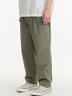 Khaki Utility Pants With Relaxed Fit, Khaki Relaxed Fit Utility Pants, Khaki Relaxed Fit Cargo Trousers, Relaxed Fit Cargo Pants With Welt Pockets For Streetwear, Casual Olive Wide-leg Pants, Casual Khaki Parachute Pants With Side Pockets, Baggy Casual Cargo Pants With Welt Pockets, Baggy Casual Pants With Welt Pockets, Casual Khaki Work Pants With Welt Pockets