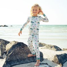 The softest bamboo toddler and kids pajamas in our Coastal Christmas pattern! This beachy holiday print is perfect for celebrating in the warmer climates. Check out more with this print for the cutest sibling match, and don’t miss the picture book and puzzle tie-ins from Lucy’s Room! SWEET DREAMS: Made from high quality bamboo, our pajamas are the recipe for a perfect night's sleep. Our bamboo pajamas start with our signature buttery soft bamboo/spandex blend that has the perfect amount of stret Spaghetti Strap Rompers, Halloween Long Sleeve, Bamboo Pajamas, Baby Pajamas, Long Sleeve Kids, Boys Romper, One Piece Outfit, Coastal Christmas, Holiday Prints