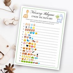 a printable baby shower game with emoj pictionary