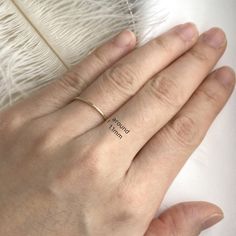 One piece of everyday durable, milgrain stacker ring handcrafted in 14K solid gold. It is the ESSENTIAL ring for your treasure box. Ships within 3 business days. - Band width: 1.1mm - Band thickness: 1.3mm - Made in 14 karat gold. - Stamp with 14K. Tiny Classic Midi Rings For Everyday, Classic Tiny Midi Rings For Everyday, Classic Hypoallergenic Rose Gold Midi Rings, Classic Yellow Gold Hypoallergenic Midi Rings, Classic Rose Gold Delicate Midi Rings, Dainty Engraved 14k Gold Ring, Classic Tiny Stackable Rings For Gift, Classic Tiny Stackable Rings As Gift, Tiny Classic Stackable Rings For Gift