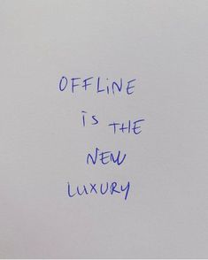 a piece of paper with writing on it that says offline is the new luxury