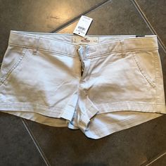 Hollister Shorts Casual Silver Bottoms Short Length, Silver Stretch Bottoms For Summer, Casual Silver Short Bottoms, Silver Bottoms With Built-in Shorts, Silver Stretch Bottoms Short Length, Silver Stretch Bottoms For Spring, Silver Casual Shorts For Spring, Trendy Silver Shorts For Summer, Trendy Silver Short Bottoms