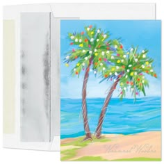 a greeting card with two palm trees on the beach